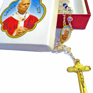 Rosario transparente con crucifijo dorado y medalla de San Juan Pablo II en estuche blanco
